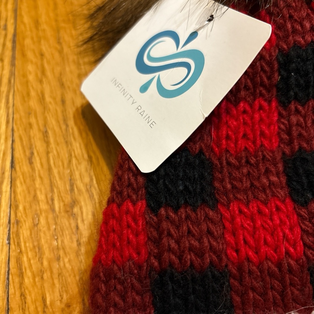 Infinity Raine Red and Black Plaid Beanie with Faux Fur Pom - Picture 4 of 6
